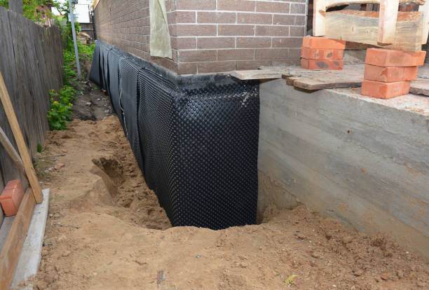 Happy homeowners after waterproofing job in McMinnville